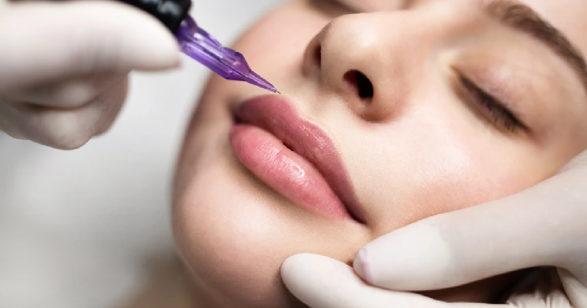 A woman receiving a lip blushing treatment in Annapolis, MD